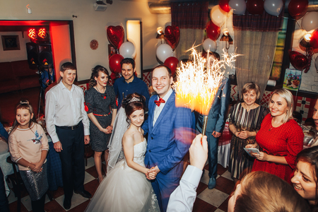 Kirov, Russia - November, 24, 2017: Bride and groom dance together with guests in a dancing hallのeditorial素材