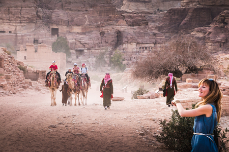 Petra, Jordan - December, 21, 2017: Old city Petra and tourists in itのeditorial素材