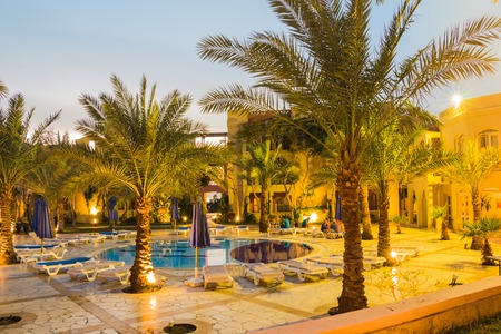 Aqaba, Jordan - December 19, 2017: Swimming pool and palm near it in hotel Marina Plaza in Aqaba in Tala bay in Jordanのeditorial素材