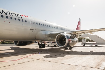 Aqaba, Jordan - December, 26, 2017: Airplane on the runway in airport in a summer sunny day in...