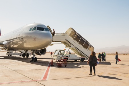 Aqaba, Jordan - December, 26, 2017: Airplane on the runway in airport in a summer sunny day in Jordanのeditorial素材