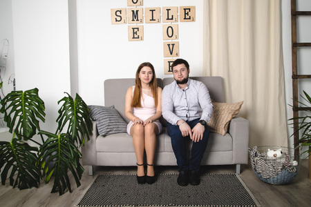 Lovely couple have fun and relax at home together