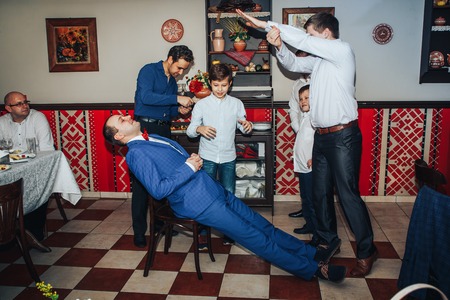 Russia, Kirov - November 24, 2017: Guests take part in the games organized during the wedding Banquetのeditorial素材