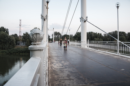 Orenburg, Russia - August 03, 2016: Bridge between Europe and Asia in Orenburg city in Russia and people walking through itのeditorial素材