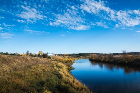 River landscape with white clouds in summer day