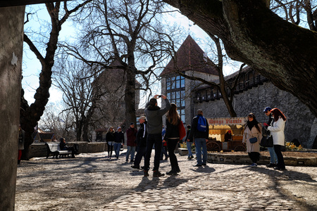 Estonia, Tallin - March 31, 2018: People on the street of Tallin cityのeditorial素材