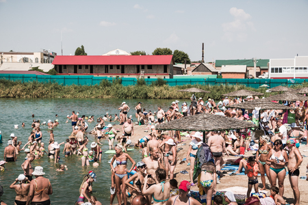 Russia, Sol-Iletsk - August 03, 2016: Salt Lake in Sol-Iletsk, water, beach and people there. Summer sunny dayのeditorial素材