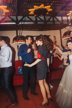Kirov, Russia - November, 24, 2017: Wedding guests dancing in a dancing hall in restaurantのeditorial素材