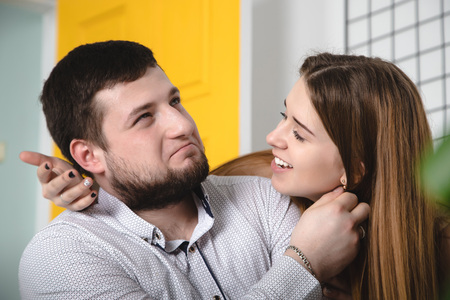 Lovely couple have fun and relax at home together. Lifestyle conceptの写真素材