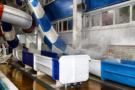 Multi-colored slides in the indoor water Park