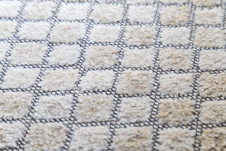 Gray fabric texture in a cage. Close up picture for backgroundの写真素材