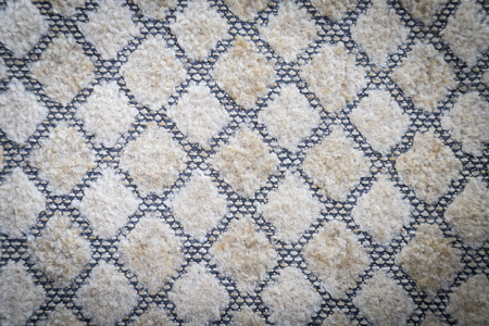 Gray fabric texture in a cage. Close up picture for backgroundの写真素材