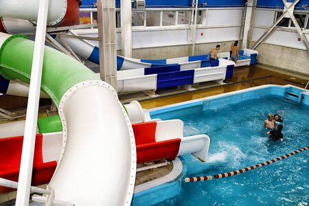 Kirov, Russia - August 19, 2018: Teenagers and slides on party AQUA MADFLOW at Russia in Kirov city in AquPark named Friendshipのeditorial素材
