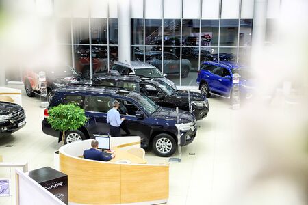 Kazan, Russia - May 18, 2018: Cars in showroom of dealership Toyota in Kazan city. Top view