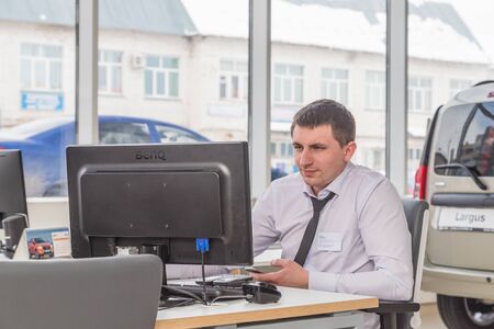 Kirov, Russia - March 06, 2018: Manager in showroom of dealership russian car plant AVTOVAZ named SeverAvto in Kirov city in 2018のeditorial素材