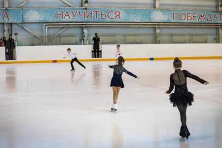 Kirov, Russia - October 11, 2018: Small skaters at the ice arena in the city of Kirovのeditorial素材