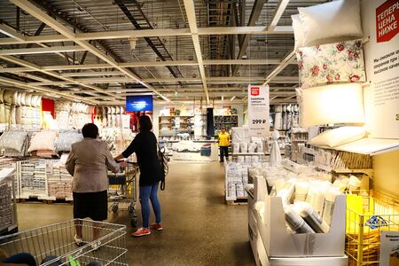 Kazan, Russia - August 31, 2018: Interior of large IKEA store with a wide range of products in...