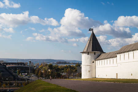 Kazan, Russia - October 17, 2018: View of white tower on the hill and blue sky with white clouds background. Kremlin in Kazan city in Tatarstan in Russiaのeditorial素材