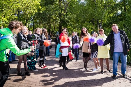 Kirov, Russia - June 15, 2018: People have fun in the park in summer day during russian wedding