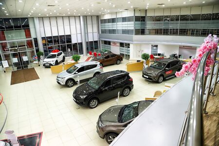 Kazan, Russia - May 18, 2018: Cars in showroom of dealership Toyota in Kazan city. Top view