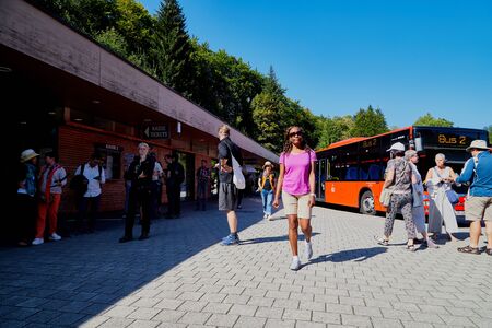 Germany, Bavaria - September 17, 2018: Tourists on the bus stop wiht bus for traveling to Hitler's...