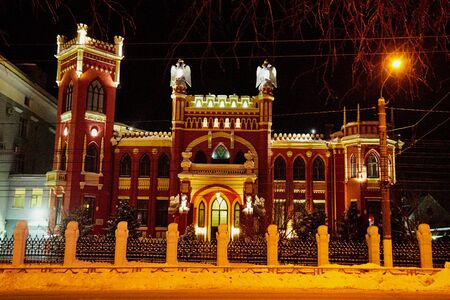 Kirov, Russia - December 28, 2018: FSB building with sculptures and lights at night in Kirov cityのeditorial素材