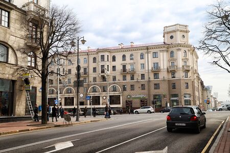 Minsk, Belarus - April 05, 2018: Modern street in Minsk city. Buildings and cars outside. Independence Avenue in Belarus in a spring dayのeditorial素材