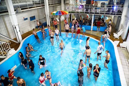 Kirov, Russia - August 19, 2018: Teenagers on party AQUA MADFLOW at Russia in Kirov city in AquPark...