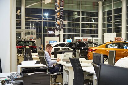 Kazan, Russia - October 16, 2018: Manager in showroom of dealership Kia in Kazan city in Tatarstan in 2018のeditorial素材