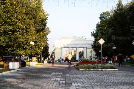 Yoshkar-Ola, Russia - August 30, 2018: Entrance with columns to the city Park and people in a summer dayのeditorial素材