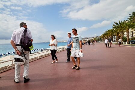 Nice, France - September 23, 2018: Promenade near the sea and the people on it in Nice in France in a good dayのeditorial素材