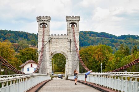 Nice, France - September 21, 2018: Big old bridge in the mountains in France and tourist on it in a summer or autumn dayのeditorial素材