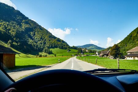Lucerne, Switzerland - September 19, 2018: Village view from the window of a moving car near Lucerne...