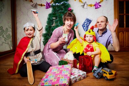 Kirov, Russia - December 17, 2018: Happy family with two children cheerfully spend house time before Christmas or New Yearのeditorial素材