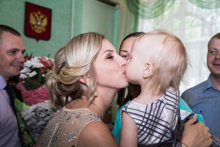 Kirov, Russia - June 29, 2018: Bride, groom and guests indoors after ceremony of registration marriageのeditorial素材