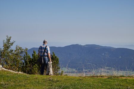 Rauschberghof, Germany - September 18, 2018: Tourist on observation deck in the mountains on a summer day. Beautiful mountains landcapeのeditorial素材