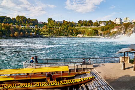 Rhine, Switzerland - September 19, 2018: Boat near the pier near the Rhine falls in Switzerlandのeditorial素材