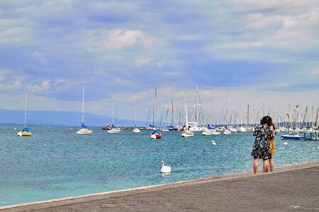 Geneva, Switzeland - September 21, 2018: Geneva, Switzeland - September 21, 2018: Tourisths on...