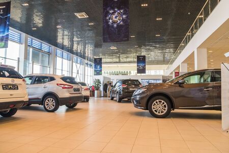 Nizhny Novgorod, Russia - March 14, 2018: Cars in showroom of dealership Nissan in Nizhny Novgorod...