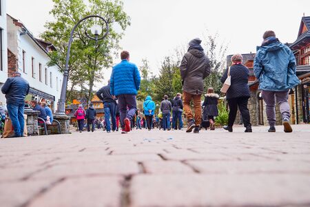 ZAKOPANE, POLAND - September 29, 2018: People on street for tourist walking and promenade in the city center in Zakopane in Polandのeditorial素材