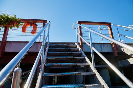 Heviz, Hungary - September 27, 2018: Ladder with railing on alneological therapeutic lake Heviz in Hungary with warm water during all time of a yearのeditorial素材