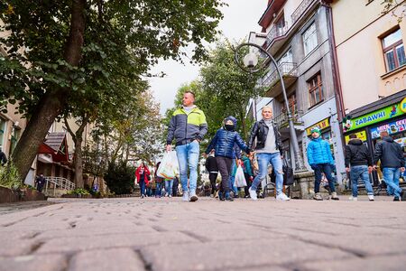 ZAKOPANE, POLAND - September 29, 2018: People on street for tourist walking and promenade in the...