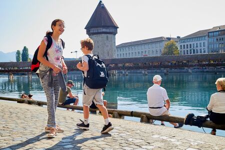 Lucerne, Switzerland - September 20, 2018: Wooden Chapel Bridge, Water Tower in the Old Town of Lucerne city in Switzerlandのeditorial素材