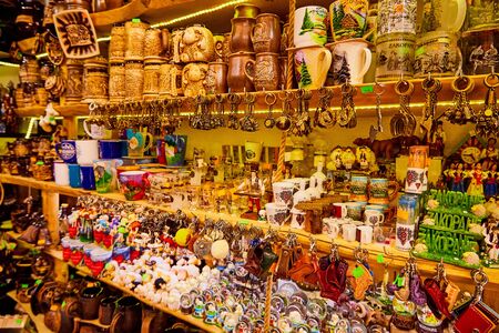 Poland, Zakopane - September 29, 2018: Many funny interesting european souvenirs inside of tourist marketのeditorial素材