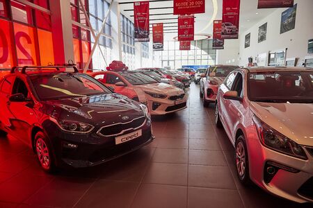 Murmansk, Russia - June 21, 2019: Cars in showroom of dealership KIA in Murmansk city in Russia