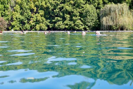 Heviz, Hungary - September 27, 2018: People on a warm water of therapeutic lake Heviz in Hungary in a sunny dayのeditorial素材