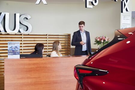 Murmansk, Russia - June 21, 2019: Managers in showroom with cars of dealership Lexus in Murmansk city in Russiaのeditorial素材