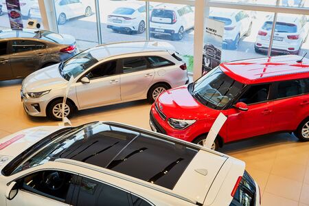 Vologda, Russia - June 18, 2019: Cars in showroom of dealership KIA in Vologda city in Russia. Top...
