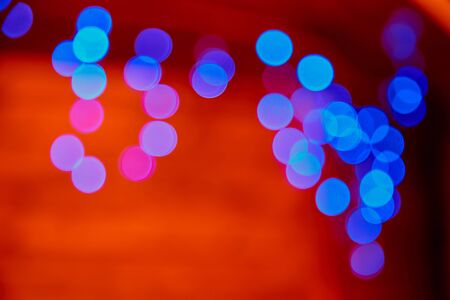 Abstract texture with light blue bokeh and black backgroundの写真素材