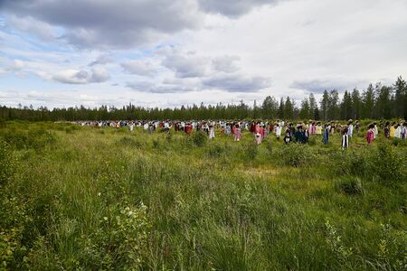 SUOMUSSALMI, FINLAND - JULY 24, 2019: View to the group of objects in people clothes which looks...